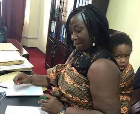Viral Photo Of Sierra Leone Minister Carrying Her Baby While Working In Office