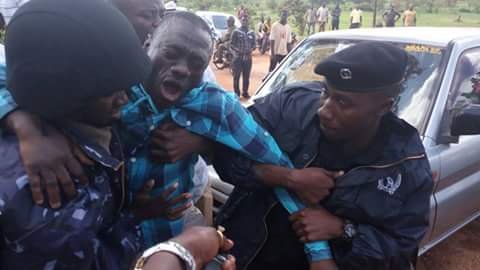 Uganda’s Kizza Besigye Man Handled Like A Thief By Police In His Own Compound