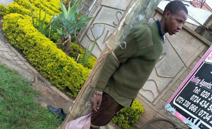 Watchman Beaten Up and Tied To A Pole After Being Busted Stealing Bread